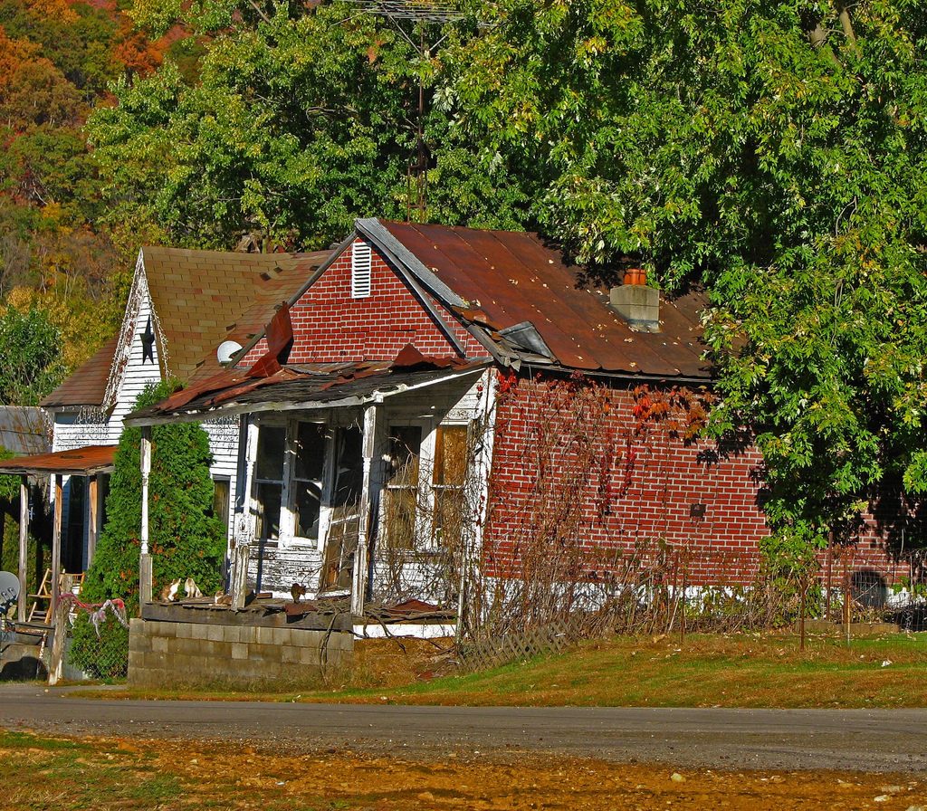 Photo by Don O'Brien — a collapsing house "[s]een during a visit to a small town along the Ohio Rver."