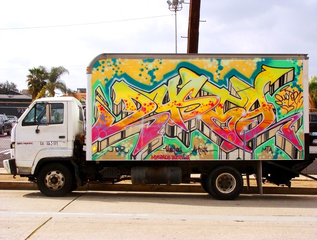 pastel graffiti mural on a truck