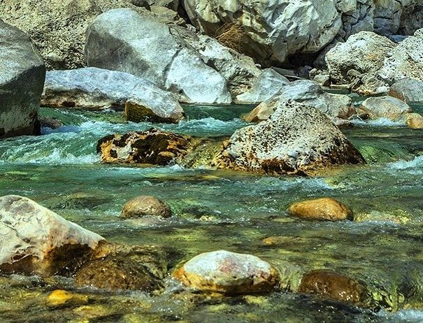 climbing river rocks