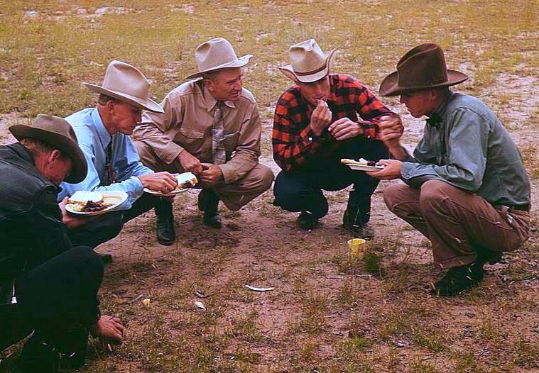 Men of the community of Pie Town, New Mexico eating at the barbeque (LOC)